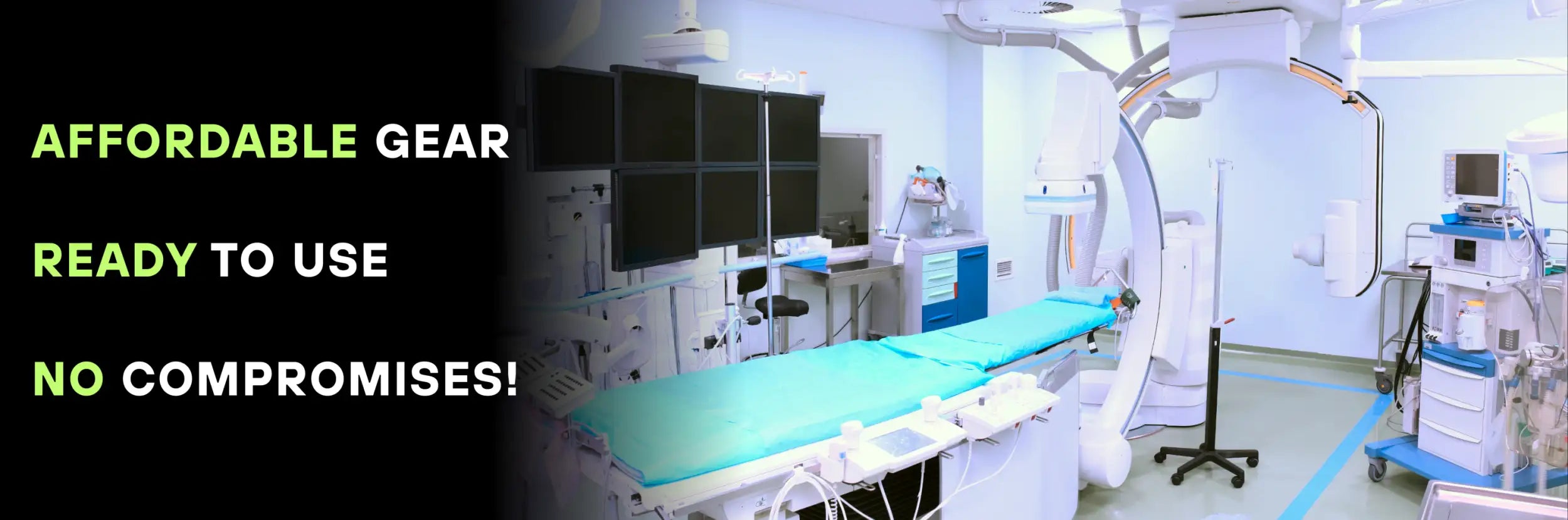 The image shows a medical imaging suite with an overhead c-arm x-ray machine, multiple monitors on walls and carts, and various medical equipment.